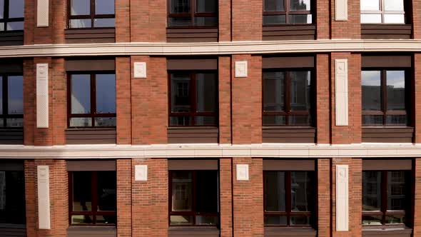 The building is brick and the Windows