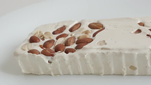 Oriental nougat halva with almonds 4K pan footage