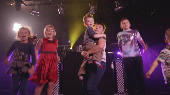 Kids Dancing and Partying at a Children's Disco.