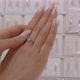 А woman tries on a diamond ring. Closeup of beautiful hand with ring - VideoHive Item for Sale
