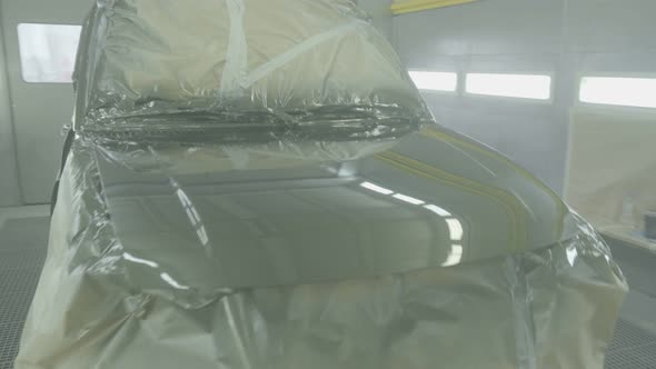 Painting an SUV Car in a Modern Spray Booth. Professional Car Painting. Corrosion Protection