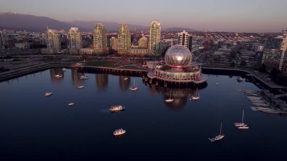 Science World on False Creek shore at sunset, Vancouver in Canada. Aerial panoramic view