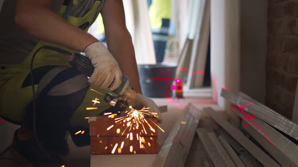 Close Up of Worker Welding Steel Structure of Wall at Construction Site