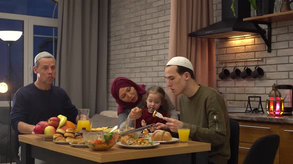 Authentic Muslim family observes the holy month of Ramadan at home under lockdown