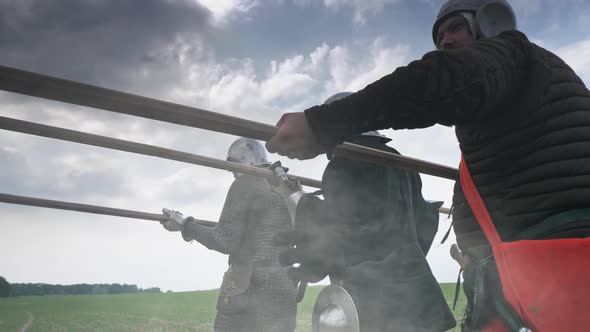 A Group of Medieval Knights with Spears Preparing To Attacking.