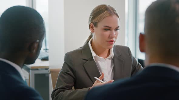 Corporate leader manager communicating with his team about a new project