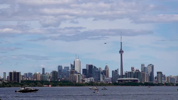 Toronto, Canada - The waterfront and a helicopter is flying in the sky of Toronto, other side showin