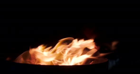 Flames of Fire in slow-motion on a dark background