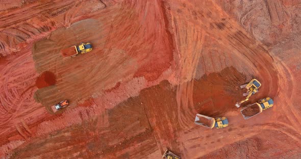 Aerial View at a Crawler Excavator Digging Soil Excavating Moving Earth