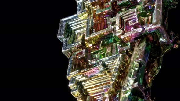 Macro of the Stone Bismuth Mineral on a Black Background Close Up