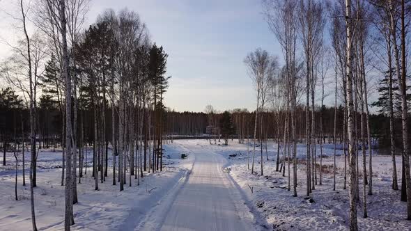 Winter landscape with snow covered road