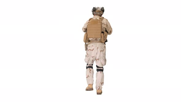 Armed Man in Camouflage with Assault Rifle Looking for a Target on White Background