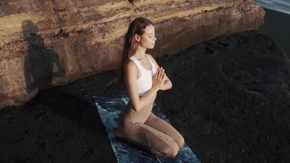 Portrait of Beautiful Girl Meditates and Concentrated on Breathing Slow Motion