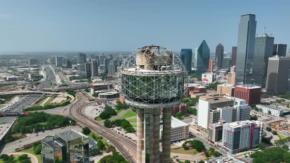 Downtown Dallas TX skyline. Major corporate Fortune 500 headquarters in Texas city. Aerial orbit of