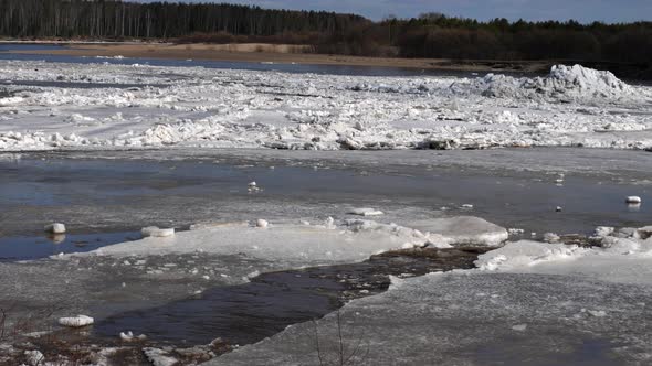 Ice Floats On River