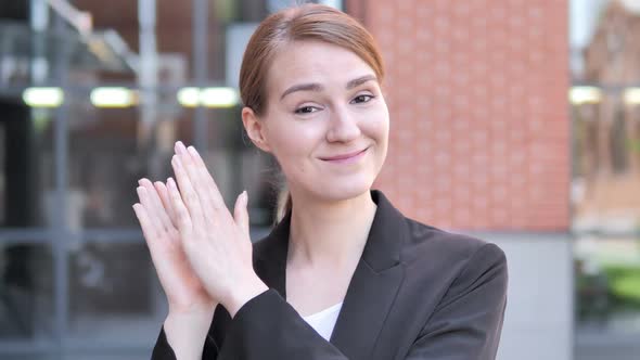 Applauding Young Businesswoman Clapping