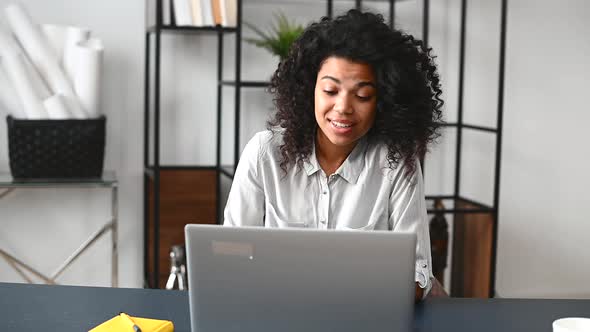 Confident AfricanAmerican Female Office Employee