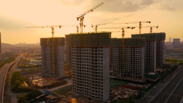 Aerial of construction site at sunset