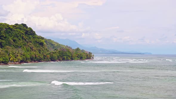 Costa Rica Pacific Ocean Landscape, Aerial Drone View of Pacific Coast Waves Breaking and Tropical R