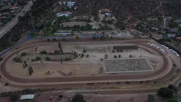 Aerial drone view of an equestrian center. Parallax motion from right to left