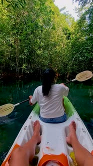Couple in Kayak in the Jungle of Krabi Thailand Men and Woman in Kayak at a Tropical Jungle in Krabi