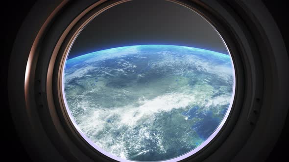 Earth As Seen Through Window Of Spaceship, Flight Of The Space Station Above The alt