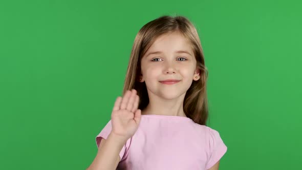 Baby Is Waving To Others. Green Screen