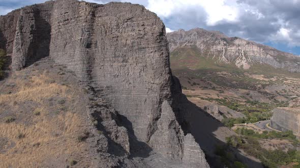 Flying towards rocky cliff face