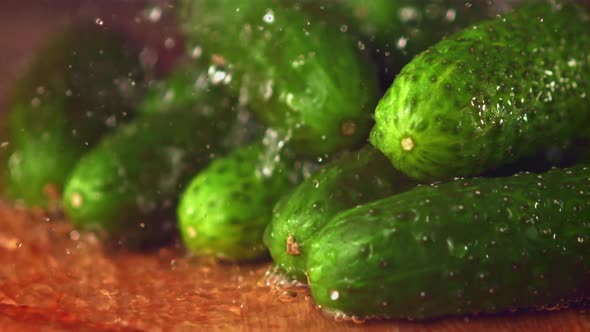 Super Slow Motion on Fresh Cucumbers Drops Water