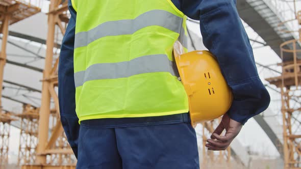 Mid-Section of Construction Worker Outside