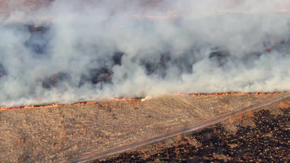 Epic Aerial View of Smoking Wild Fire