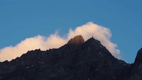 Timelapse of clouds passing over Piltriquitron Hill summit at sunset, El Bolsón, Patagoia Argentina.