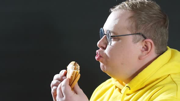 Emotional Funny Guy Enjoying Fast Food