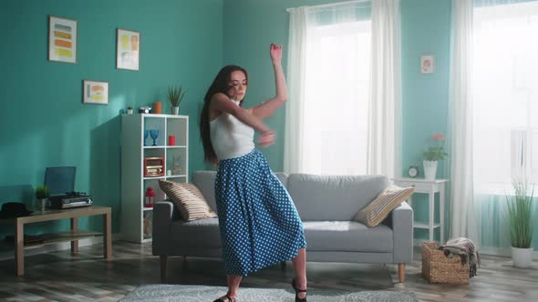 Talented Woman Is Dancing at Home