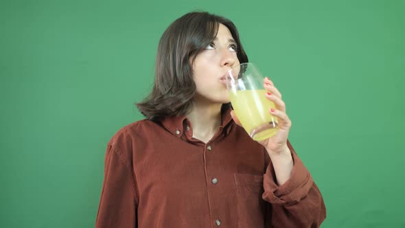 Woman Cooling Off With Lemonade