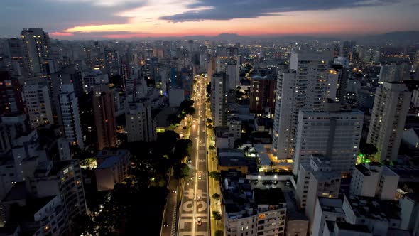 Aerial time lapse landscape of downtown Sao Paulo Brazil. Traffic at famous avenue