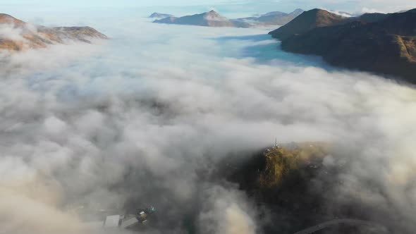 Aerial view of Unalaska Bay with fog on Unalaska island, Alaska, United States.