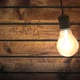 Swinging Incandescent Bulb in Timber-house Darkened Room - VideoHive Item for Sale