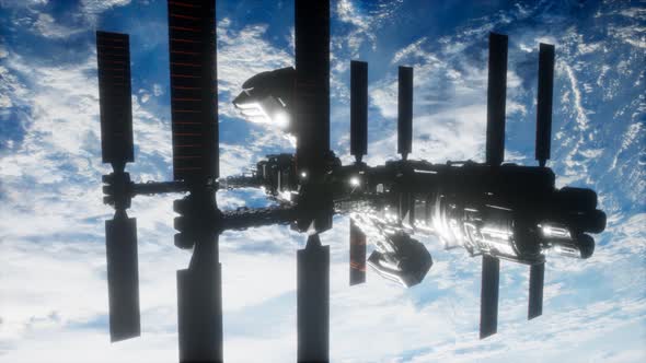 International Space Station in Outer Space Over the Planet Earth alt