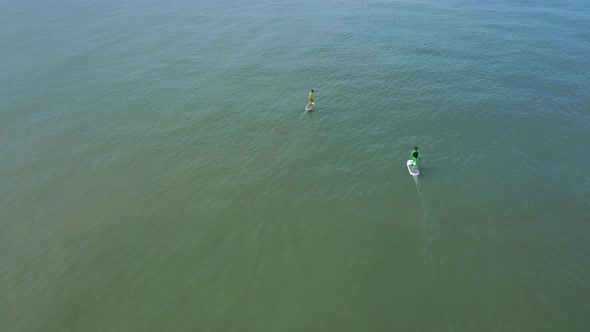 Aerial view of people doing water sport in Knokke, Belgium.