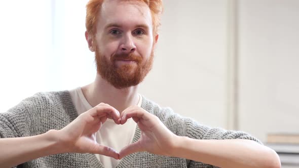 Heart Sign made by Young Man, Expressing Love