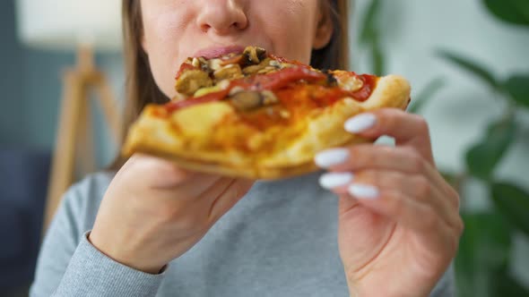 Woman Eating Pizza