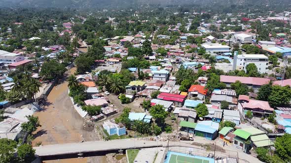Aerial drone of capital city Dili after natural disaster cyclone and flash floods in Timor Leste, So