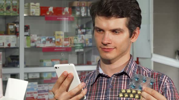 Young Man Buying Medications at the Drugstore 1080p