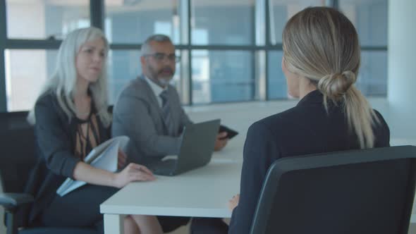 Female Candidate Meeting and Talking To Employer