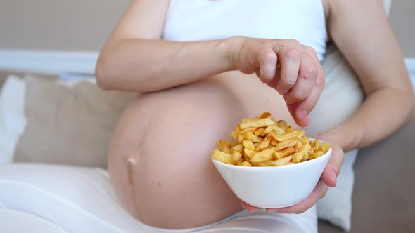 Pregnant Woman Eating Unhealthy Junk Food