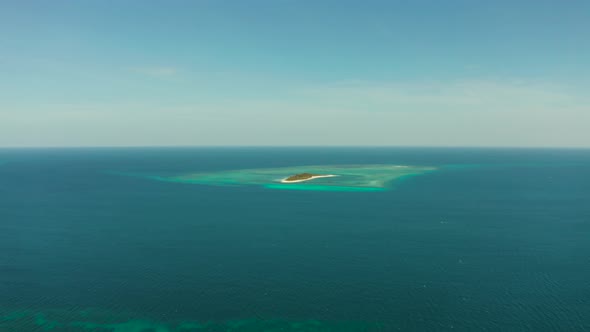 Travel Concept with a Sandy Beach and Blue Sea