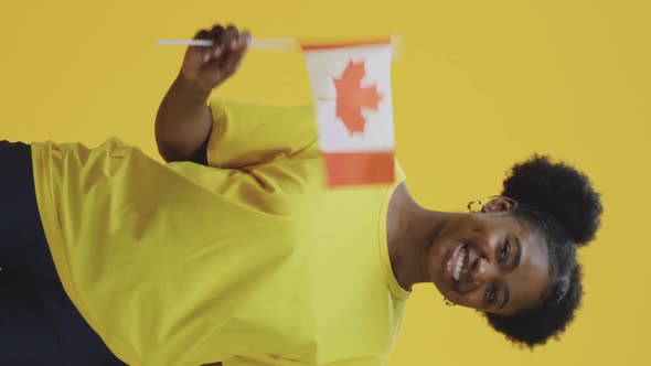 Woman Waving Canadian Flag