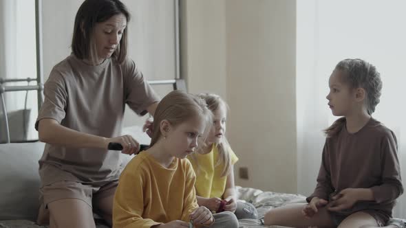 Mom Talks with Daughters at Home