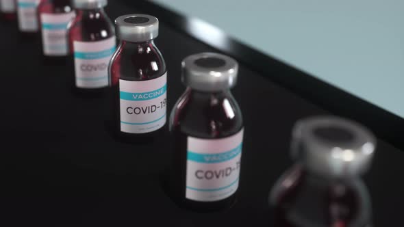Coronavirus Vaccine in Ampoules on the Production Line